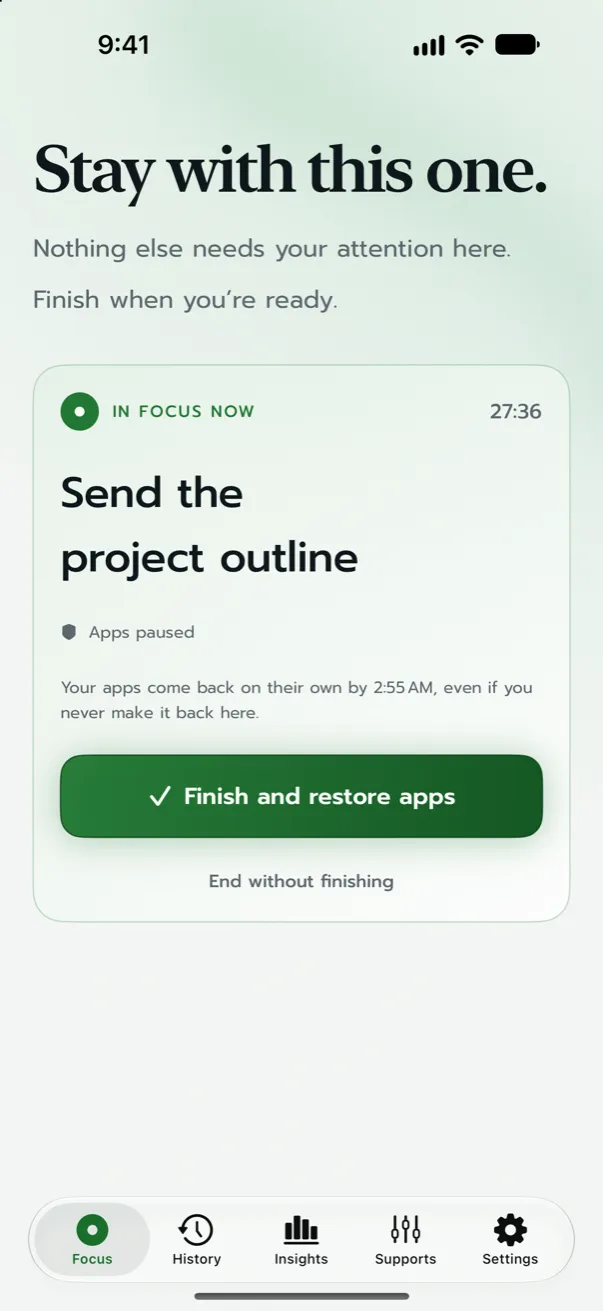 An active focus in Task Focus showing elapsed time, the note ‘Apps paused’, and a Finish and restore apps button